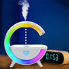 Colorful crescent moon humidifier with floating water beads and digital clock on wooden table