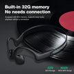 Black bone conduction headphones with built-in 32G memory, displayed on a vinyl record