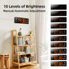 LED digital wall clock with 10 brightness levels in a modern living room above bookshelf