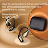 Black and gold wireless Bluetooth earphones with memory silicone, lightweight comfort design.