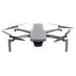 Gray DJI Mini SE drone with camera and four propellers on a white background