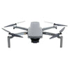 Gray DJI Mini SE drone with camera and four propellers on a white background
