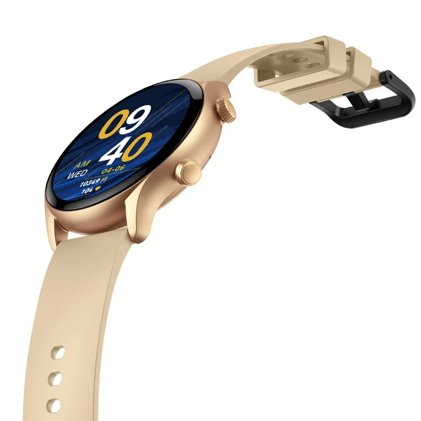 Gold smart watch with beige silicone band and digital display showing time and date