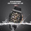 NAVIFORCE men's black waterproof watch with gold accents splashing in water, 3ATM rating