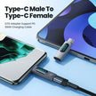 Type-C male to female PD 100W charging cable connected to smartphone and tablet