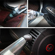 Handheld car vacuum cleaner used on car mat, door panel, and air vent for interior cleaning