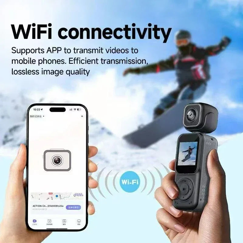 Hand holding action camera with WiFi connectivity and smartphone, snowboarder in background