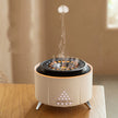 Modern white tabletop aromatherapy diffuser emitting mist in a cozy indoor room