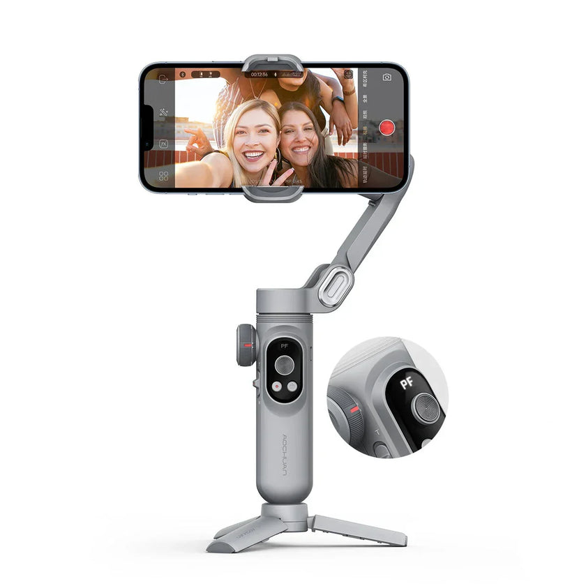 Smartphone gimbal stabilizer tripod holding phone with selfie of smiling women
