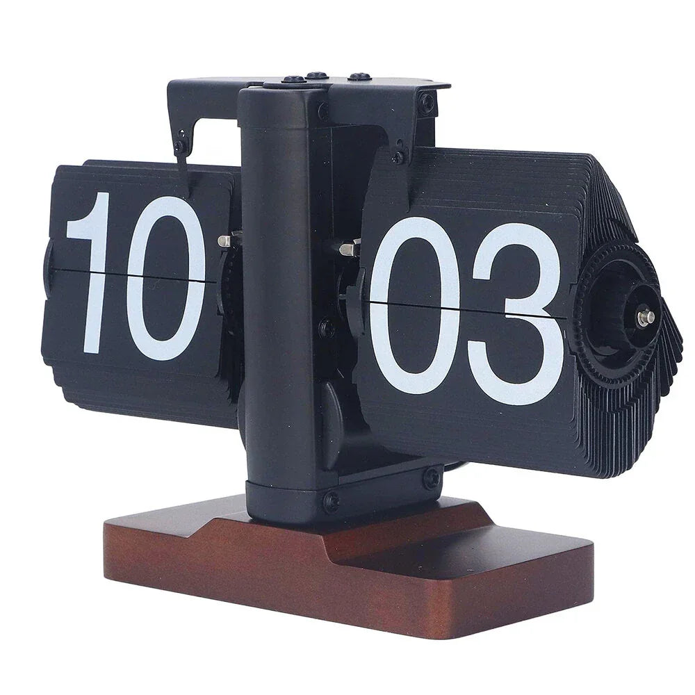 Retro flip clock with black cards, white numbers, and brown wooden base on white background