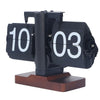 Retro flip clock with black cards, white numbers, and brown wooden base on white background
