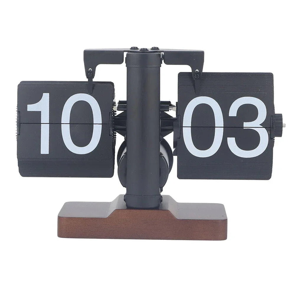 Retro flip clock with black cards, white numbers, and brown wood base on white background